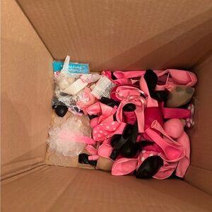 Minnie Mouse first birthday set up items and tutu.